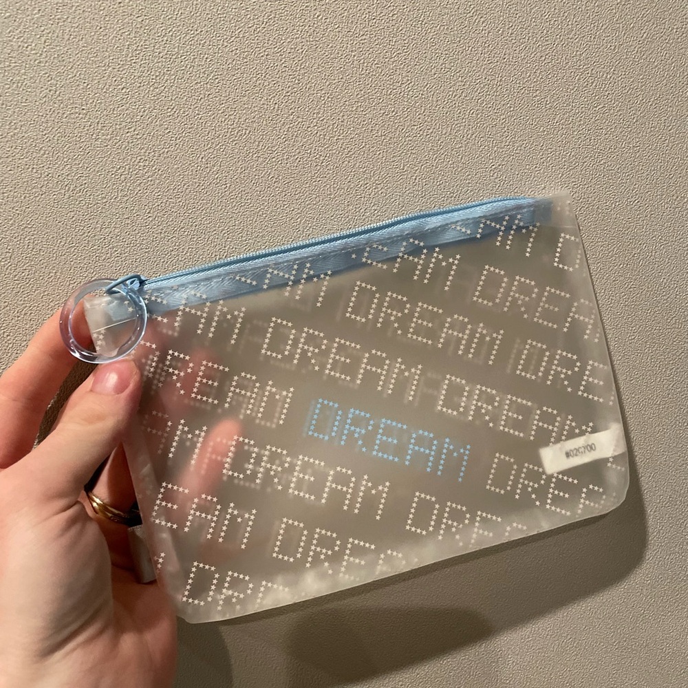 FREE WITH 5/$25 MAKEUP PURCHASE! Clear Dream Pouch with Blue Zipper